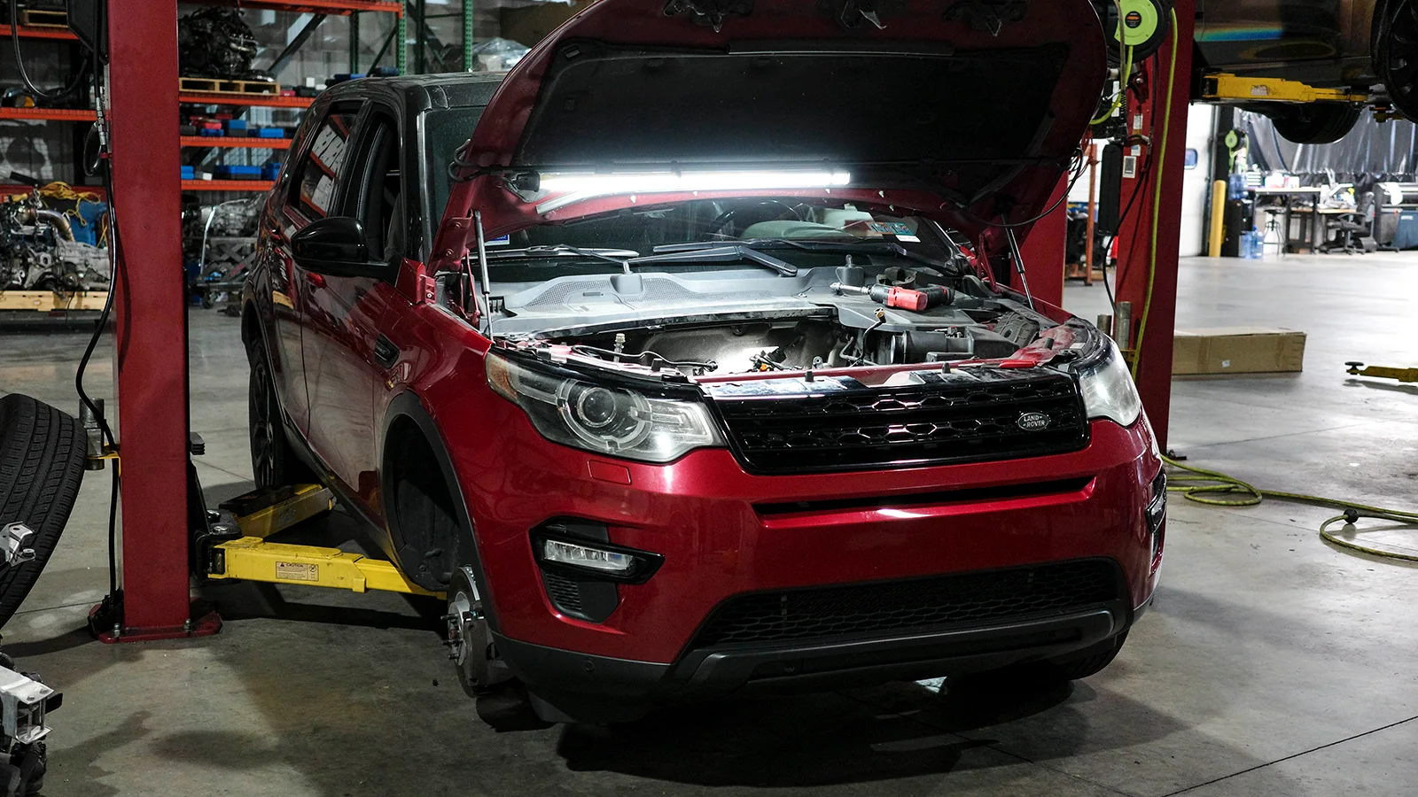 Land Rover in the service bay at Vollux Autowerks in Schnecksville