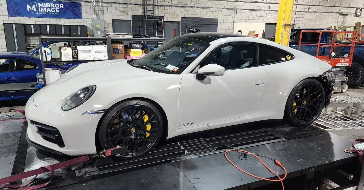 White Porsche 992 GTS on the dyno