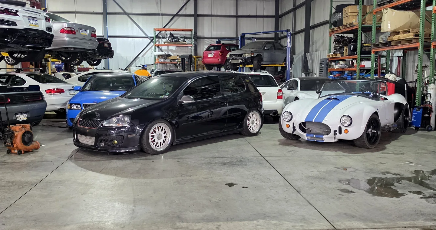 Vollux Autowerks shop interior with European vehicles in service bays