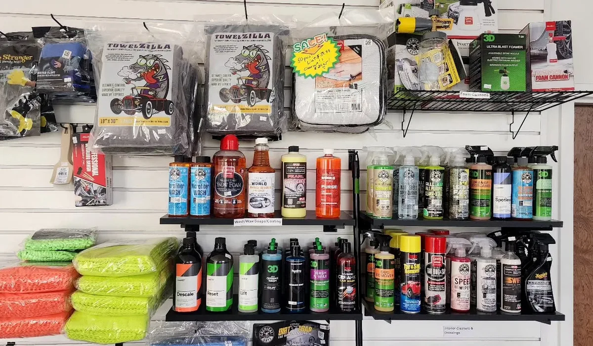 Car care products displayed in the Vollux Autowerks showroom